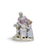 A Meissen group of 'Grandmother's Birthday', late 19th century