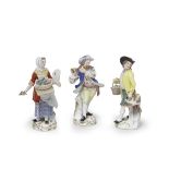 Two Meissen 'Cris de Paris' figures, together with a Meissen figure of a flautist, 1960s