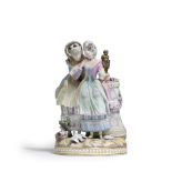 A Meissen group of two elegant ladies, known as 'The Secret' or 'The Young Bride', late 19th century