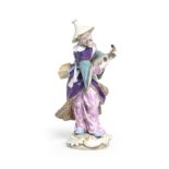 A large Meissen figure of a Malabar musician, late 19th century