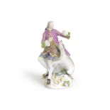 A Meissen later-decorated figure of a gentleman with a hound, the porcelain circa 1760