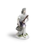 A Meissen figure of a fisherman, mid 18th century