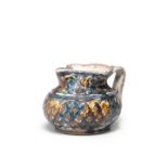 An Italian incised slipware jug, probably Veneto, perhaps Paduan, circa 1500