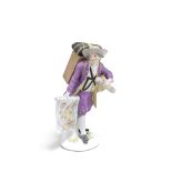 A later-decorated large Meissen 'Cris de Paris' figure of a map seller, the porcelain circa 1750