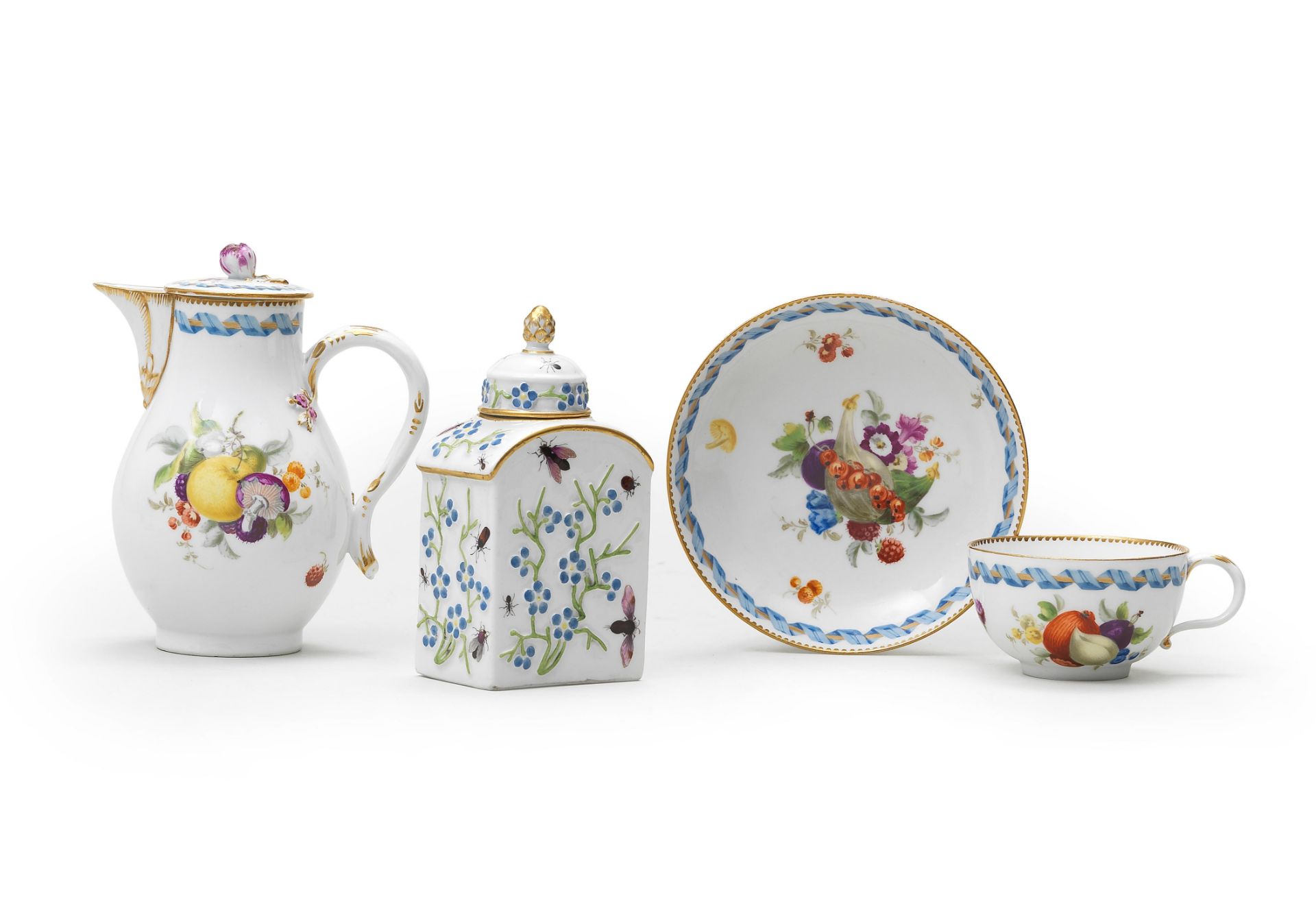 A Marcolini Meissen milk jug and cover and a teacup and saucer, late 18th century; together with ...