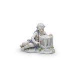 A Meissen figure of a putto with a caged hen, circa 1760; together with a Meissen figure of a lad...