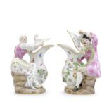 A pair of Meissen figures with jugs, early 20th century