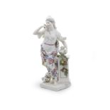 A Meissen figure allegorical of 'Smell' from a set of the Senses, mid 18th century