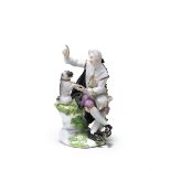 A Meissen figure of a gentleman and his pug dog, circa 1745