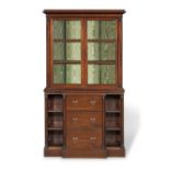 A SMALL MAHOGANY BREAKFRONT CABINET Late 19th century, in the William IV style