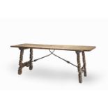 A SPANISH BAROQUE WALNUT, FRUITWOOD AND IRON MOUNTED REFECTORY TABLE Late 17th / early 18th century