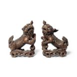 A PAIR OF CARVED WOOD BUDDHIST LIONS Republic Period