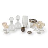 A COLLECTION OF CUT GLASS, SILVER AND SILVER-PLATED DRINKS SERVING ARTICLES Various makers, inclu...