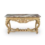 A R&#201;GENCE CARVED GILTWOOD SIDE TABLECirca 1720