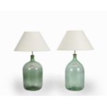 A LARGE NEAR PAIR OF GREEN GLASS LAMP BASES, ADAPTED FROM WINE BOTTLES (2)