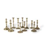 A COLLECTION OF 18TH CENTURY BRASS CANDLESTICKS (11)