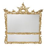 A 19TH CENTURY CARVED GILTWOOD OVERMANTEL MIRROR In the George II style