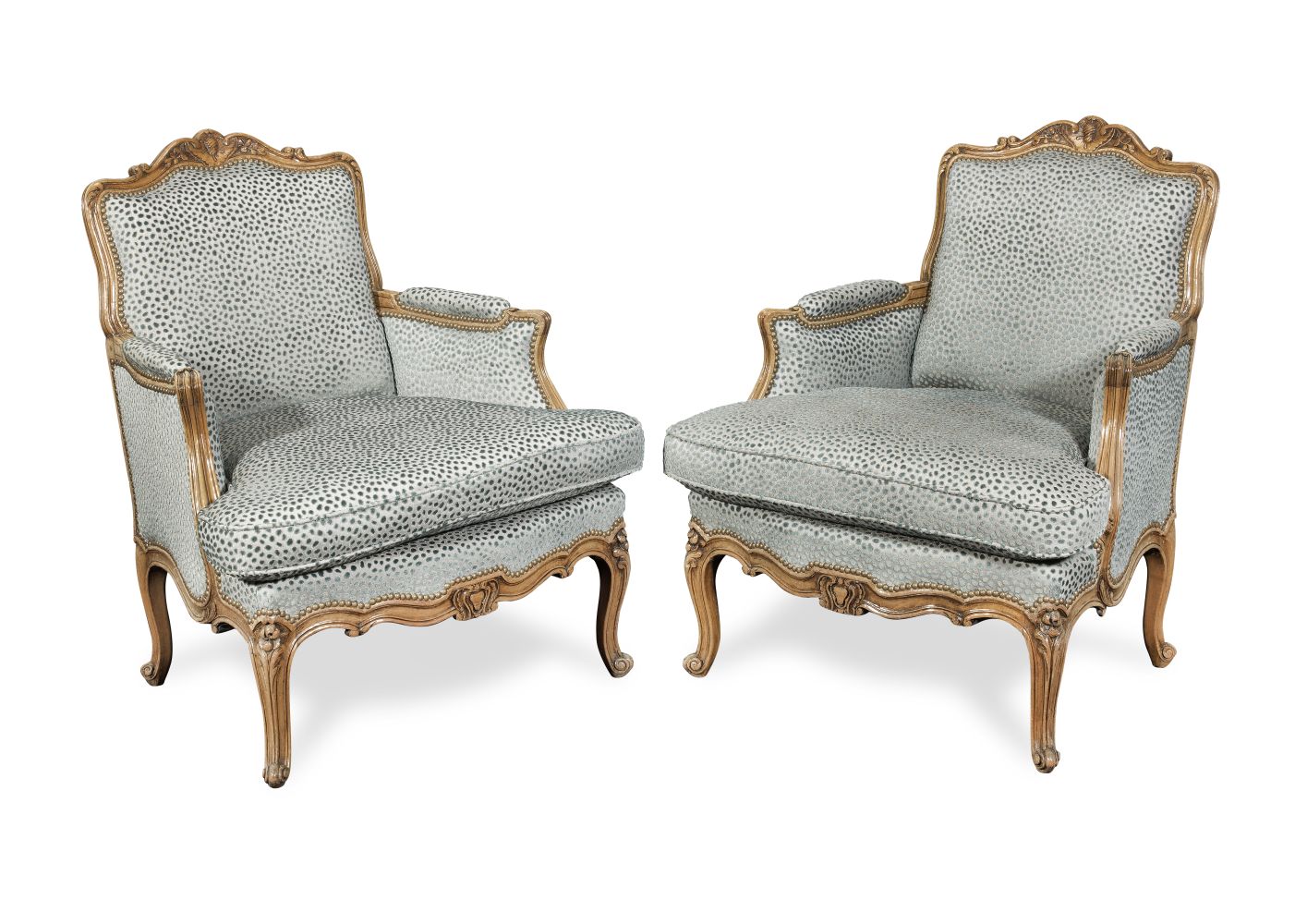 A PAIR OF LOUIS XV STYLE BEECHWOOD BERGERESLate 19th / early 20th century