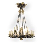 A FRENCH RESTORATION STYLE PATINATED AND GILT-BRONZE THIRTY-LIGHT CHANDELIER