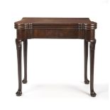 A GEORGE III MAHOGANY TRIPLE ACTION TEA AND CARD TABLE