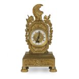 AN EMPIRE STYLE GILT-BRONZE MANTLE CLOCK Late 19th / early 20th century