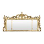 A 19TH CENTURY CARVED GILTWOOD OVERMANTEL MIRROR In the mid-18th century style