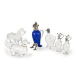 A SILVER PLATE AND BLUE GLASS NOVELTY DECANTER (6)