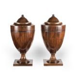 A PAIR OF GEORGE III MAHOGANY KNIFE URNS (2)