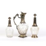 THREE FRENCH SILVER-MOUNTED GLASS CARAFES
