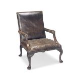 A GEORGE II WALNUT GAINSBOROUGH TYPE ARMCHAIR