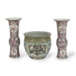 A MATCHED PAIR OF SALMON PINK GROUND FAMILLE ROSE GU VASES Circa 1900, pseudo Chinese seal marks