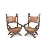 A PAIR OF SPANISH 19TH CENTURY OAK 'SAVONAROLA' ARMCHAIRSIn the 17th century style