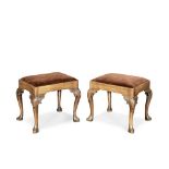 A PAIR OF GEORGE II WALNUT STOOLS (2)