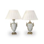 TWO ORMOLU-MOUNTED PATE-SUR-PATE CELADON PORCELAIN LAMP BASES Late 19th century (2)