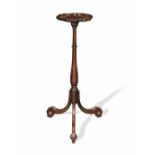 A MAHOGANY URN OR CANDLE STAND19th century, in the George II style