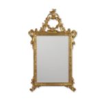 AN ITALIAN CARVED GILTWOOD MIRROR