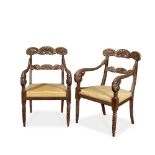 A PAIR OF ITALIAN LATE REGENCY CARVED MAHOGANY ARMCHAIRSIn the manner of Henry Thomas Peters, Gen...