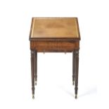 A REGENCY MAHOGANY AND EBONY STRUNG WRITING TABLE