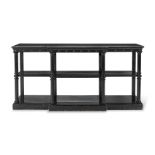 A VICTORIAN EBONISED BREAKFRONT OPEN BOOKCASE