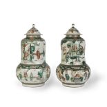 A PAIR OF KANGXI-STYLE CHINESE FAMILLE VERTE GOURD SHAPED VASES AND COVERS