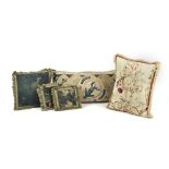 A COLLECTION OF THREE VEDURE TAPESTRY FRAGMENT CUSHIONS (5)
