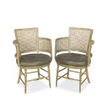 A PAIR OF GEORGE III PAINTED AND CANED BERGERESCirca 1800 (2)