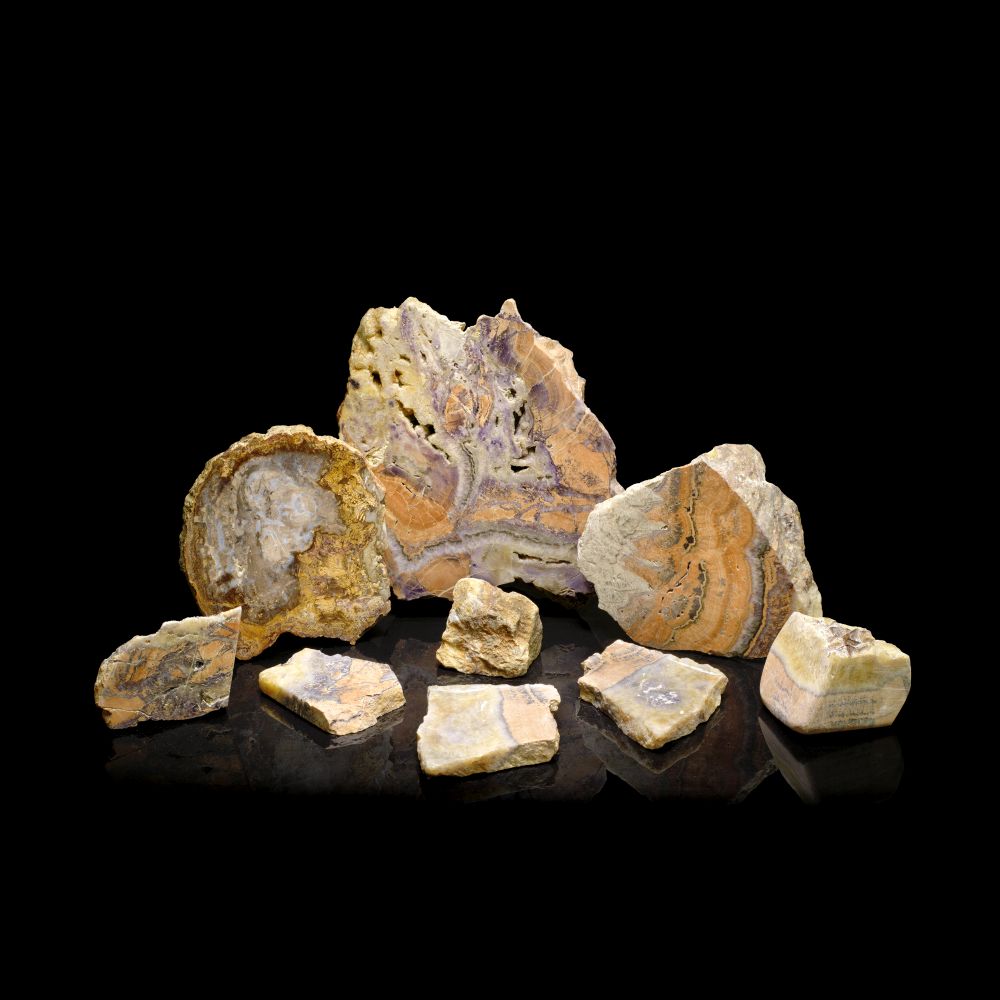 LARGE AMETHYST QUARTZ IN WHITE QUARTZ MATRIX, OTHER SIMILAR FRAGMENTS AND PETRIFIED WOOD (9)