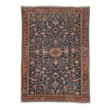 A HERIZ CARPET 379cm long x 266cm wide (149in long x 104 1/2in wide)