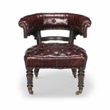 A VICTORIAN MAHOGANY HORSESHOE BACK LIBRARY OR DESK CHAIRMade by Holland & Sons