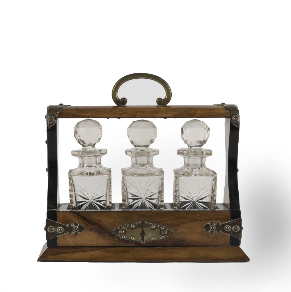 A VICTORIAN WALNUT LIQUOR TANTALUS