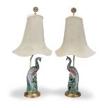 A PAIR OF CHINESE EXPORT FAMILLE ROSE PORCELAIN PEACOCKS MOUNTED AS LAMPS Possibly 18th century a...