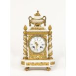 A LOUIS XVI STYLE ORMOLU-MOUNTED WHITE MARBLE MANTLE CLOCK Early 20th century