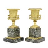 A pair of French Restauration gilt bronze models of the Medici vases (2)