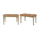 A near pair of Italian late 18th/early 19th century carved giltwood and gilt gesso side tables on...